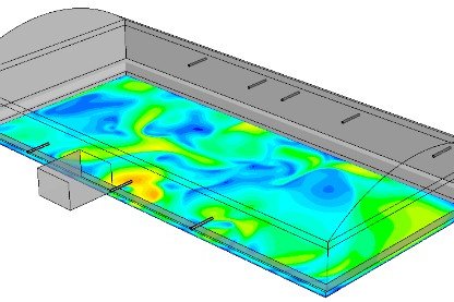 Computergestützte Strömungssimulation (CFD) mit farblicher Darstellung der Strömungsverteilung innerhalb eines technischen Systems. Computergestützte Strömungssimulation (CFD) mit farblicher Darstellung der Strömungsverteilung innerhalb eines technischen Systems.